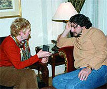 JC listens to question from interviewer in Budapest, 2003